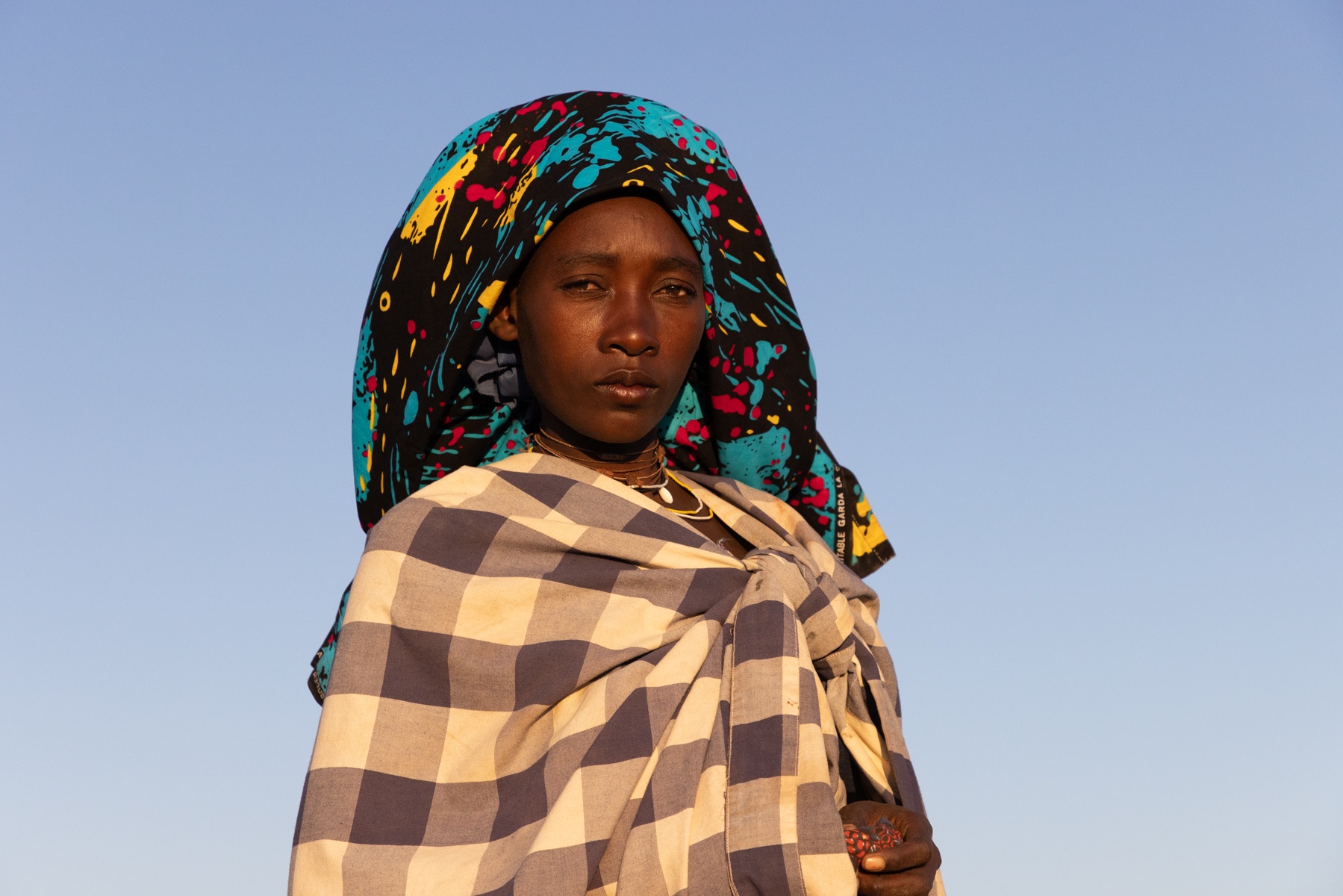 Portrait of a stunning Ovakuvale woman on our tribal photography tour of Angola
