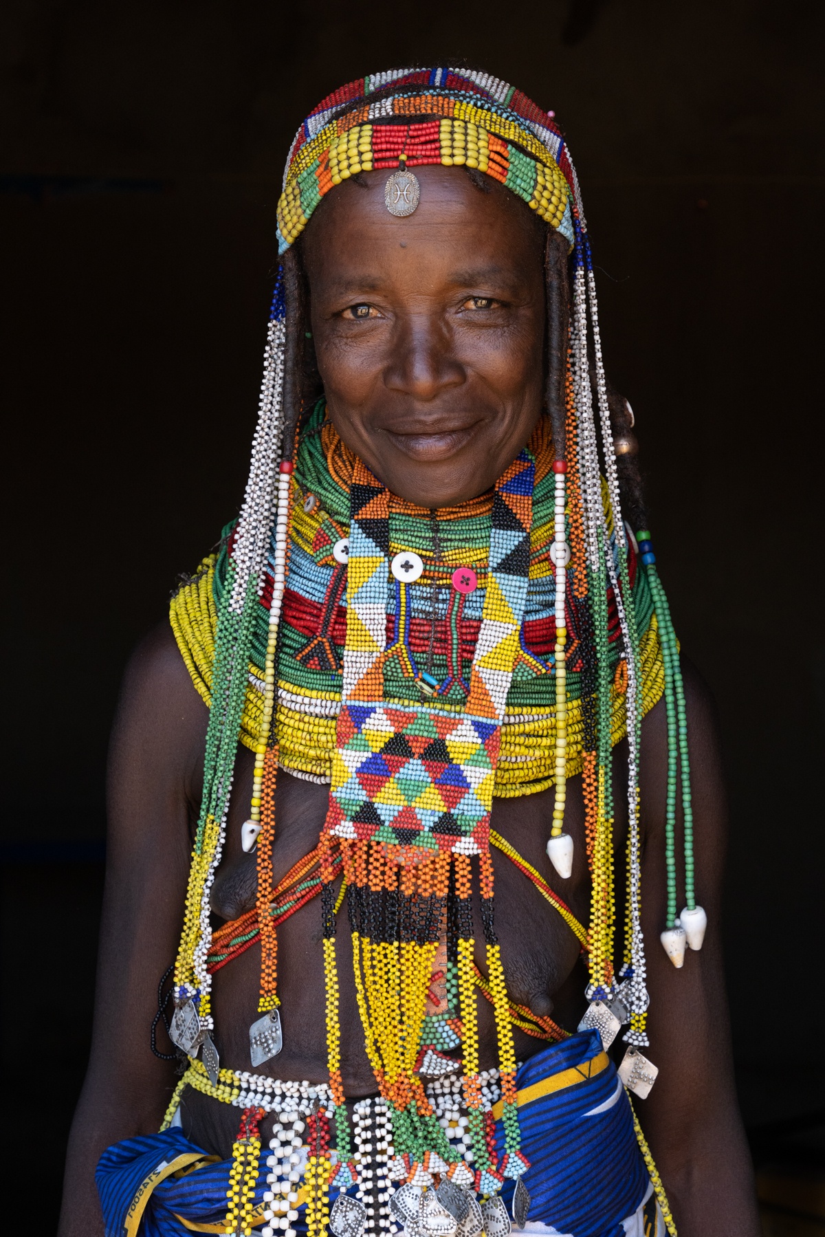 Angola's Ovamwila women are known for their colourful Vilanda necklaces and beaded decorations