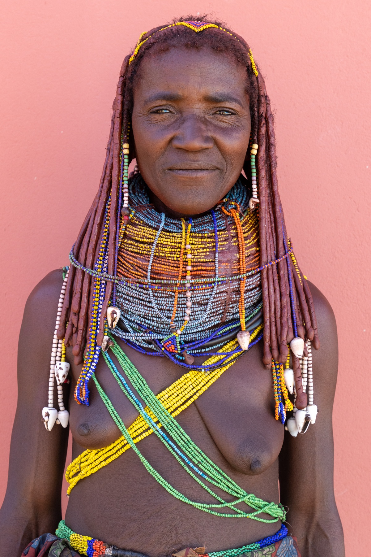 Portrait of a smiling Ovamwila woman on our Angola photography tour