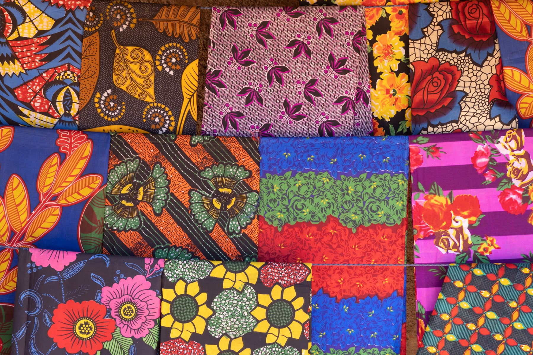 Angola's local markets are coloured by reams of wax cloth for sale