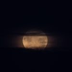 A Falklands full moon peeks at us through the clouds (image by Inger Vandyke)