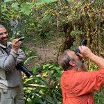 Fabrice adds a little light to the scene of some leaf-tailed gecko photography at V.O.I.M.M.A., Andasibe (image by Mike Watson)