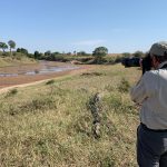 Wild Images guest Howard photographs a stretch of the Sand River, looking towards Tanzania (image by Mike Watson)