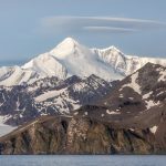 Lenticular clouds are known for creating turbulence in the mountains. The spindrift of snow created by these clouds is visible here (image by Inger Vandyke)
