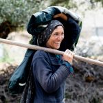 Despite their heavy work, the people of Parkachik still laugh and smile during the harvest season (image by Julie-Anne Davies)