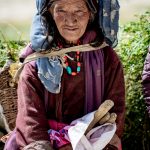 A Zanskari woman carrying a basket on her way home from the local market at Padum (image by Julie-Anne Davies)