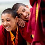 Young monks laugh together at Karsha Monastery (image by Julie-Anne Davies)
