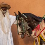 A Batonu rider and his horse (image by Inger Vandyke)