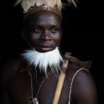Portrait of a Dikpantri dancer. His white beard fashioned out of animal fur signifies he is passing from warrior to elder (image by Inger Vandyke)