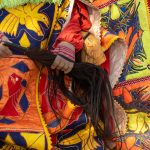 Detail of Egungun dancer hands holding an Asosi made from horse hair (image by Inger Vandyke)