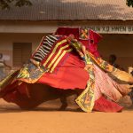 An Egungun dancing at a private ceremony of our tour (image by Inger Vandyke)