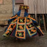 Before terrorising the local Tofinu kids an Egungun twirls to prepare for the chase in Ganvié (image by Inger Vandyke)