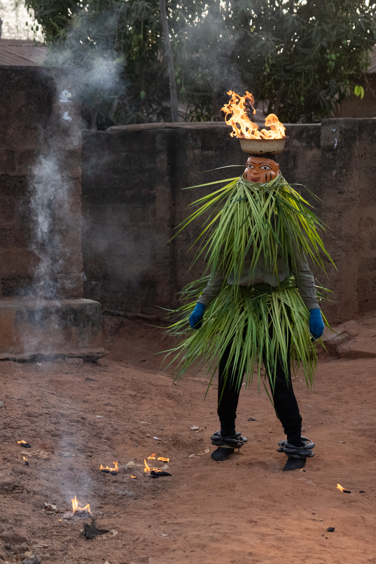 Guèlèdè fire spitter. What a fantastic and wild thing to see! (image by Inger Vandyke)