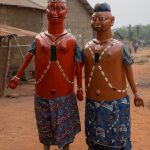 The gigantic 'orange men' of the Guèlèdè ceremony (image by Inger Vandyke)