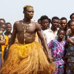 Crowds of onlookers watch a display of Koku at the voodoo festival in Grand Popo (image by Inger Vandyke)