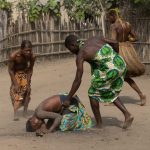 A dancer falls into trance as she enters the Koku ceremony (image by Inger Vandyke)