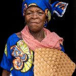 A beautiful Mahé matriarch dressed in her finest clothes for us to photograph her in remote Benin (image by Inger Vandyke)