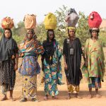 A group of Fulani women walking the roads of Benin to sell traditional medicines (image by Inger Vandyke)