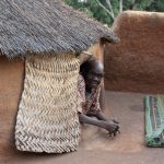 Portrait of an elderly Otamari woman at home in her Tata (image by Inger Vandyke)