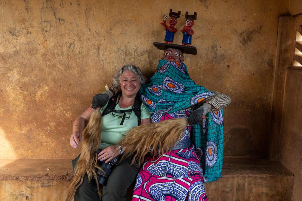 Rimma and one of the incredible masked dancers of Guèlèdè (image by Inger Vandyke)