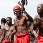 A Shango head man summons the spirits at a judiciary ceremony (image by Inger Vandyke)