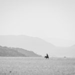 A lone Himba riding his donkey in remote northern Namibia (image by Sean Braine)