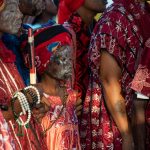Brightly dressed celebrations go hand in hand with Tron, the voodoo ceremony of happiness in Ganvié (image by Inger Vandyke)