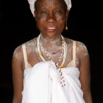 In Vodunsi tradition the future brides wear white and cover themselves in kaolin powder 'to feed the spirits' (image by Inger Vandyke)