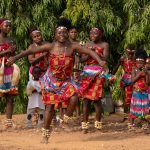 A small group of Waaba women performing a ceremony to thank us for helping out one of their sons in the past year (image by Inger Vandyke)