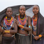 A group of young Arbore women covered by their signature black cloth (image by Inger Vandyke)