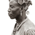 Profile of a prominent Benna head man wearing a carabiner as an earring (image by Inger Vandyke)