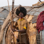 A young Dassanech man dressed to celebrate Dimi (image by Inger Vandyke)