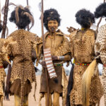 Decorated Dassanech men covered in skins and yellow ochre to celebrate Dimi, the Dassanech initiation ceremony of young girls (image by Inger Vandyke)