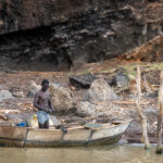 A Gamo man prepares to go out on Lake Chamo to fish from his temporary island home (image by Inger Vandyke)