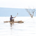Gamo fisherman paddling his raft out on Lake Chamo (image by Inger Vandyke)