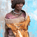Portrait of an elderly Hamer Besheda woman with her goat skin dress and decorated kalabash headdress (image by Inger Vandyke)