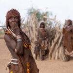 A stunning Hamer woman giggling during our visit to her village (image by Inger Vandyke)
