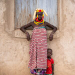 Portrait of a Karo woman with her little boy in Dus (image by Inger Vandyke)