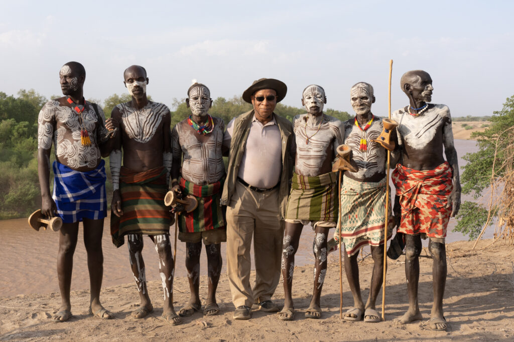 Guest with the Karo head men of Dus (image by Inger Vandyke)