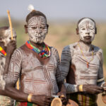 A group of Karo head men at the edge of the Omo River (image by Inger Vandyke)