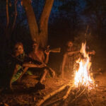 A group of young Suri men enjoy our campfire (image by Inger Vandyke)