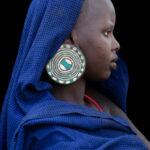 The large disc earrings of Suri girls are truly stunning (image by Inger Vandyke)