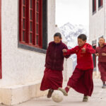  Young monks playing football at Thiksey (image by Mike Watson)