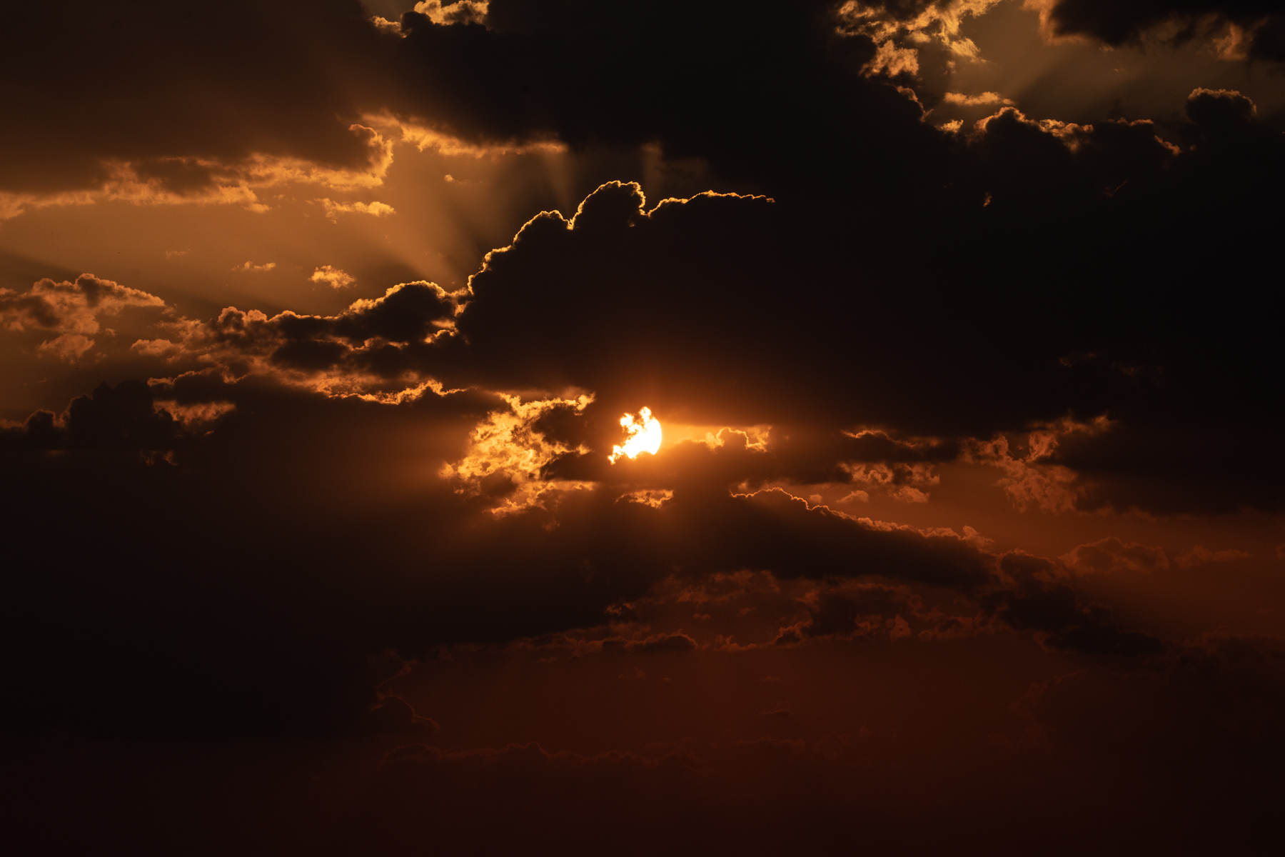 Storm skies sheltering the sunset in Luangwa (image by Inger Vandyke)