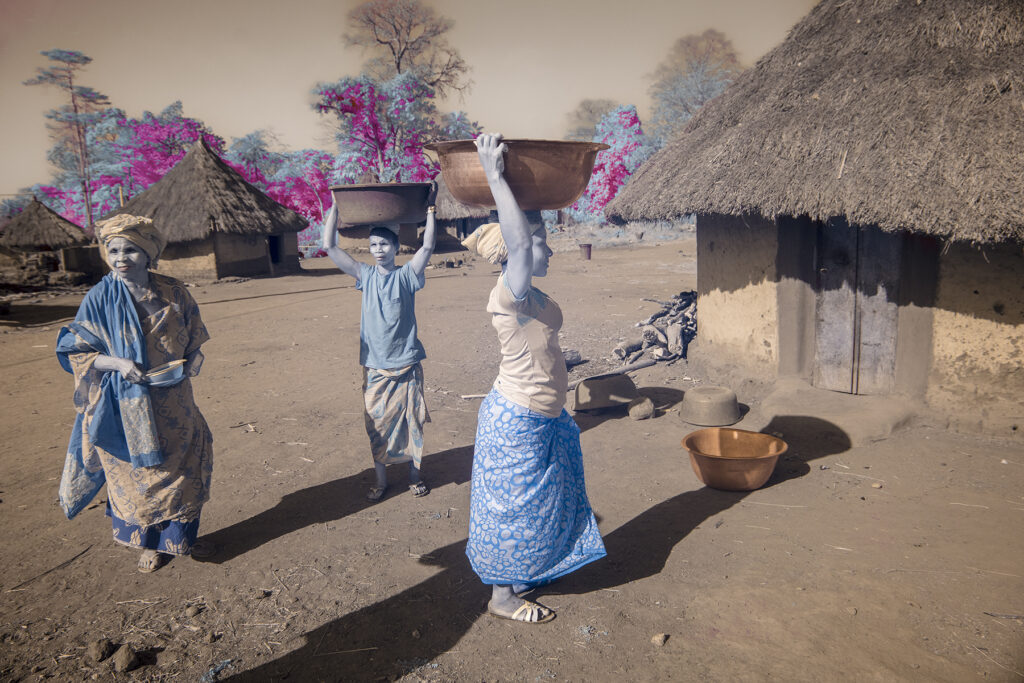 Yacouba women arrive to prepare for the ceremony of Godoufou (image by Rosalie Wang)