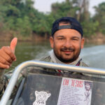 Our awesome boat driver on the river Alex (image by Mike Watson)