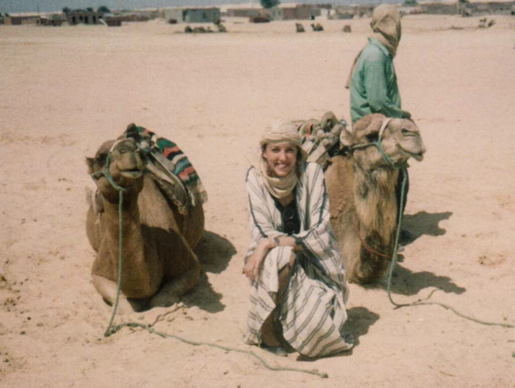 Me riding camels outside of Tamanrasset in 1990 (image by Inger Vandyke)