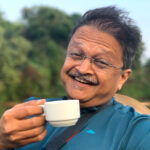 KC Jain is never far from a cuppa (image by Mike Watson)