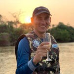 Marlon enjoys some bubbly on the river towards the end of a great tour (image by Mike Watson)