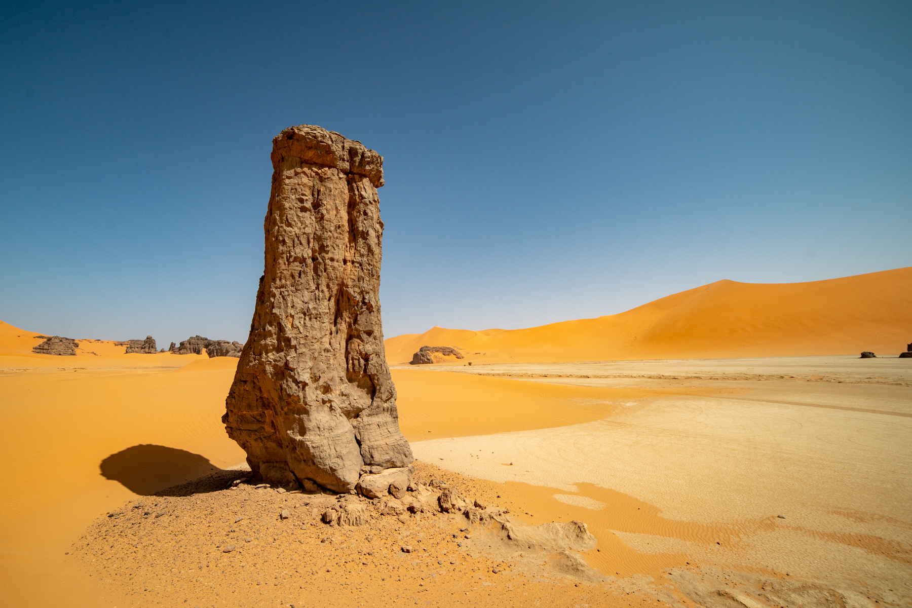Rock island in a sea of sand at Tadrart (image by Inger Vandyke)
